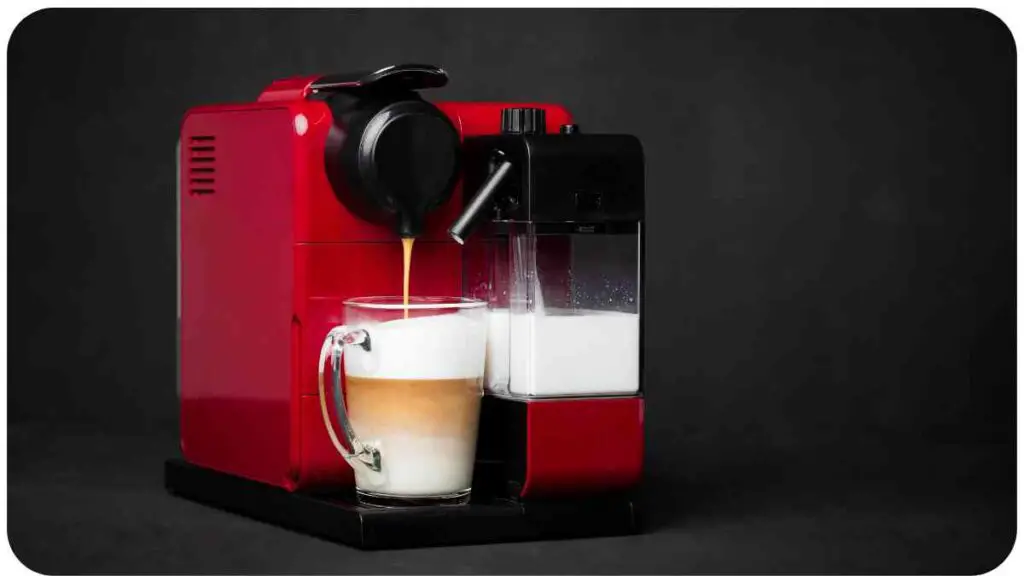 a red coffee machine with a glass of milk